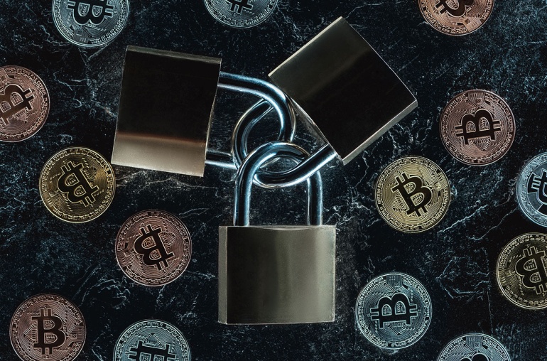 Interlocked Padlocks Surrounded by Bitcoins in Golden & Silver Coinage